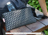 NIGHT AND DAY waist bag made of surplus car upholstery fabric - YUKI bags. Whether you wear it in the front, back or askew, this versatile, compact and spacious waist bag allows you to move freely and comfortable while your hands remain free.